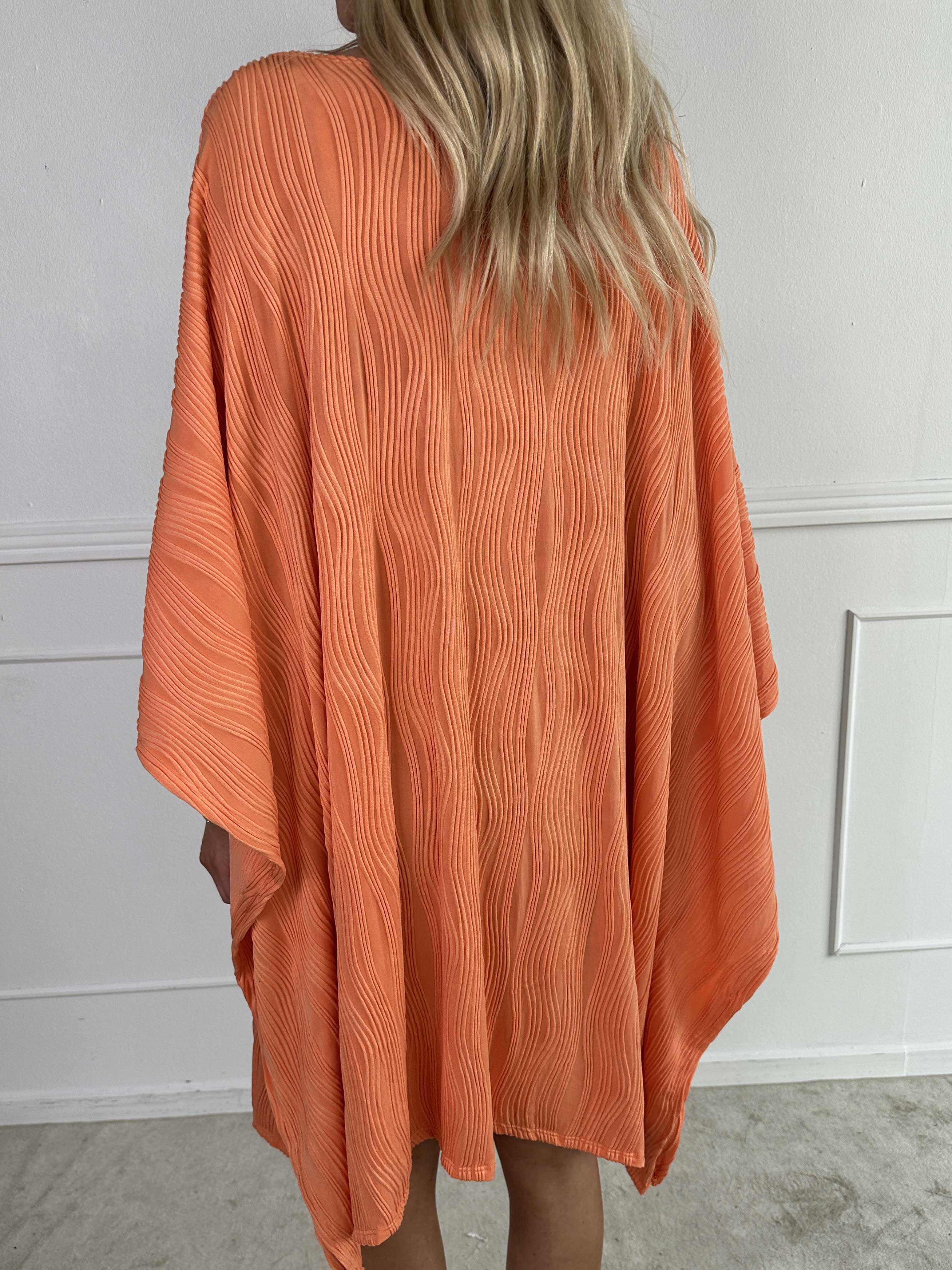 Kaja - Elastisk tunika i blødt rillet stof